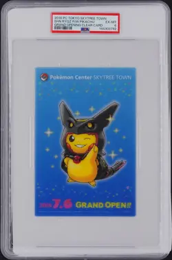 2016 POKEMON CENTER TOKYO SHINY RAYQUAZA PONCHO-WEARING PIKACHU PSA 6 - Image 1