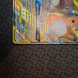 Pokemon TCG: Raichu & Alolan Raichu GX 220/236 Unified Minds Tag Team - Image 4