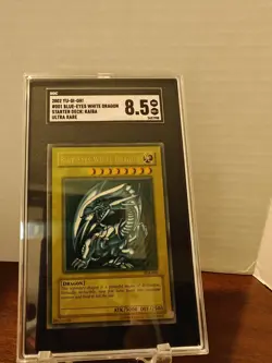 Yugioh Blue-Eyes White Dragon SDK-001 Ultra Rare 2002 Vintage SGC 8.5 NM/MT+ - Image 1
