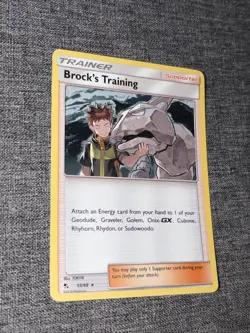 Pokemon Hidden Fates Brock's Training Holo Rare Card 55/68 NM - Image 1