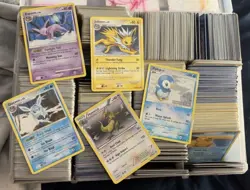 Pokemon bulk common reverse holo and holo random 200 cards for $125 2005-2011 - Image 1