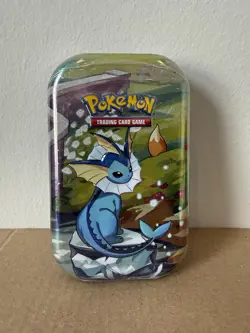 Pokemon TCG Scarlet & Violet Prismatic Evolutions Mini Tin Vaporeon BRAND NEW - Image 1