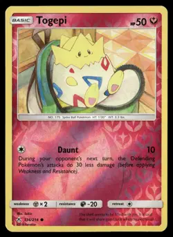 Togepi 136/214 Common Unbroken Bonds Pokemon Reverse Holo NM/M - Image 1