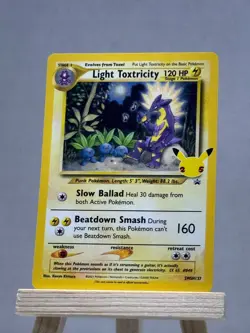 Light Toxtricity SWSH137 SWSH: Sword & Shield Promo Cards Holo - Image 1