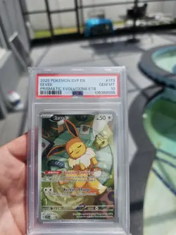 Pokemon TCG PSA 10 Eevee Pokemon Center Prismatic Evolution Promo - Image 1
