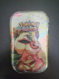 Pokemon TCG Scarlet & Violet Prismatic Evolutions Mini Tin - Flareon New Sealed - Image 1