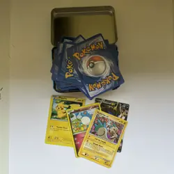 Pokemon Cards + tin - Image 1