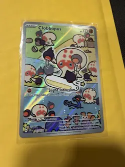 Clobbopus 207/191 Surging Sparks Illustration Rare Holo Pokemon NM - Image 1