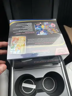 Pokemon Chaos Rising ETB Plus Prismatic Evolution Mini Tin Display - Image 3