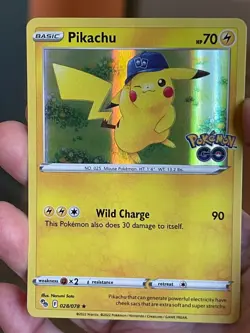 POKEMON PIKACHU 028/078 RARE HOLOFOIL POKEMON GO NM CARD - Image 1