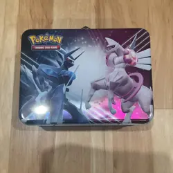Pokemon tin with mystery cards - Image 1
