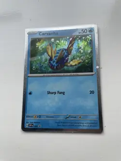 Pokemon TCG S&V Carvanha Card Cosmo Holo 093 SVP Black Star Promo - Image 1