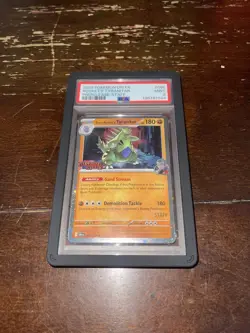 PSA 9 Team Rocket's Tyranitar 096/182 Destined Rivals Holo Prerelease Staff - Image 1