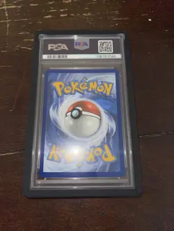 PSA 9 Team Rocket's Tyranitar 096/182 Destined Rivals Holo Prerelease Staff - Image 2