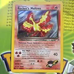 Wizards of the Coast Pokemon TCG Rocket's Moltres Gym Heroes Holo Rare ENG 012/… - Image 1