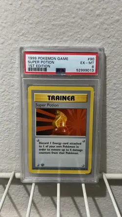 1999 POKEMON BASE SET 1ST EDITION #90 SUPER POTION PSA 6 - Image 1