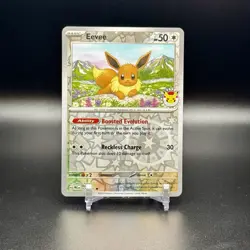 Eevee - (Pokemon Day 2025) (Reverse Cosmos Holo) #074 PRISMATIC EVOLUTIONS NM - Image 1