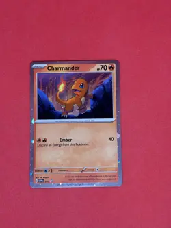 Charmander - 047 (Cosmos Holo) 047 Sv: Scarlet & Violet Promo Cards Holo - Image 1