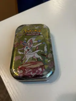 Pokemon TCG Tin Sylveon | FACTORY SEALED, 2 Prismatic Evolutions Boosters - Image 1