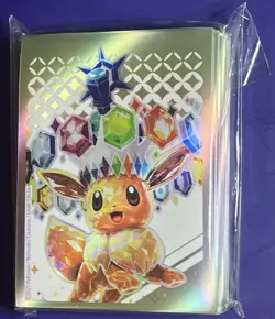 Sealed Prismatic Evolutions Eevee ETB 65 Ct Pokemon Card Sleeves - Image 1