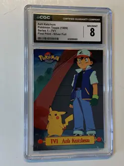 1999 Topps Pokemon #TV1 Ash Ketchum Foil Blue Logo (Smooth) CGC 8 NM/MINT PSA - Image 1