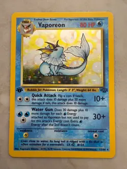 Vaporeon First Edition 12/64 Jungle Holo Rare Pokemon Card WOTC 1999 - Image 1