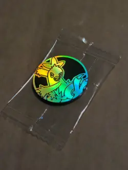 Pokemon Silver Rainbow Holographic Combusken Mini Coin From Gift Set - Image 1