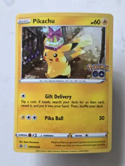 Pikachu SWSH234 Promo SWSH Black Star TCG Cosmo Holo Pokemon Go - Image 1