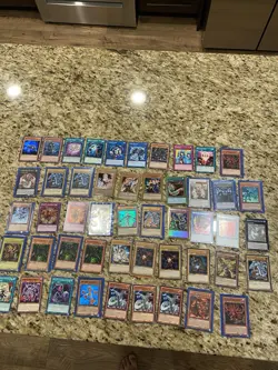 Yu-Gi-Oh! 50 Card Lot with Tin Secret, Ultra Rare Holos Lot Old Retro Blue eyes - Image 1