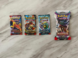 4-pack variety lot of factory-sealed Pokemon TCG Booster Packs - Image 1