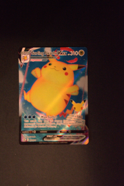 Pokemon TCG Surfing Pikachu VMAX 009/025 Celebrations Holo NM - Image 1