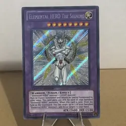 Yugioh Elemental Hero The Shining PRC1-ENV01 Secret Rare NM - Image 1