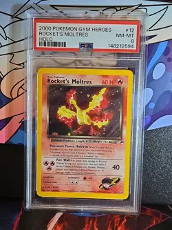 Rocket's Moltres 12/132 Holo Rare Gym Heroes Pokemon - PSA 8 - Image 1