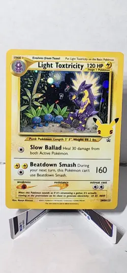 Light Toxtricity SWSH137 Black Star Promo - Celebrations Pokemon - Image 1