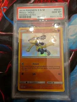 2019 POKEMON SUN & MOON HIDDEN FATES #SV21 RIOLU HOLO PSA 10 - Image 1