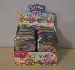 Pokemon TCG Prismatic Evolutions Full Set of 8 Sealed Mini Tins with Display - Image 1