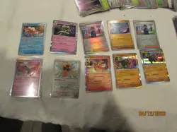 Dive into this collection of 100 Prismatic Evolution Pokemon Foil Cards - Image 2