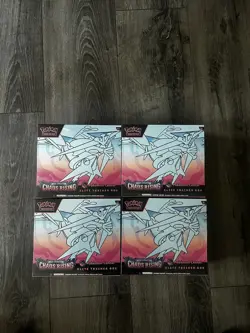Pokemon Center Chaos Rising ETB Elite Trainer Box in hand - Image 1