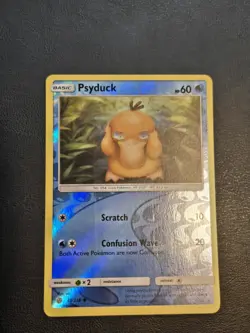 Psyduck 40/236 Pokemon - Reverse Holo Sun & Moon Cosmic Eclipse LP - Image 1