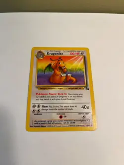 Dragonite Pokemon Card Fossil 19/62, HP/Damaged - Image 1