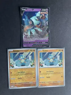 Golurk V Evolving Skies + Golett (x2/1 RevHOLO) 3-card mixed Pokemon lot - PWE - Image 1
