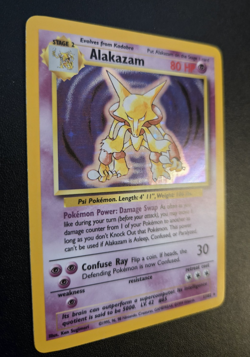 Pokemon TCG Alakazam Base Set 1/102 Holo Unlimited Holo Rare LP/NM - Image 1