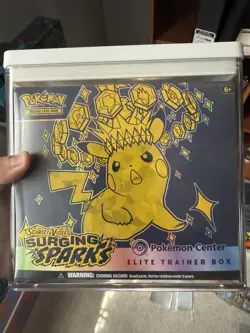Surging sparks Pokemon Center ETB sealed AND celebrations mew - Image 1