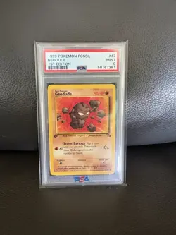 Pokemon TCG Fossil 1st Ed Geodude 47/62 PSA 9 - Image 1