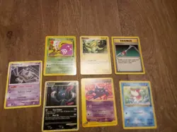 Lot of 7 Pokemon Cards Older Cards non Holo Rare and WOTC included - Image 1