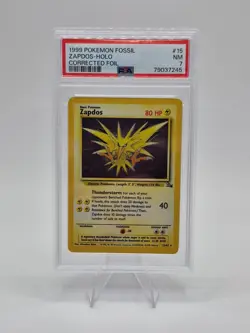 1999 POKEMON FOSSIL CORRECTED FOIL #15 ZAPDOS-HOLO PSA 7 - Image 1