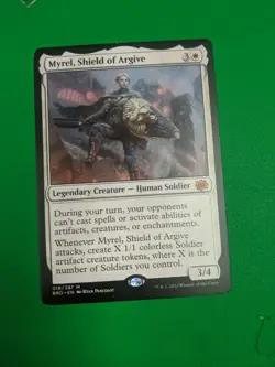 Myrel, Shield of Argive The Brothers' War Regular - Image 1