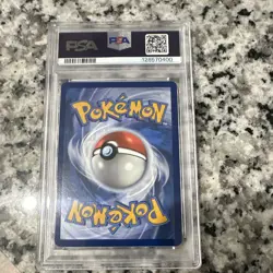 Team Rocket's Tyranitar 096/182 Pokemon Center Exclusive Rare PSA 9 - Image 2