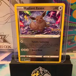 Pokemon Radiant Eevee SWSH230 Pokemon GO Promo Holo Radiant 90 HP Boost Dash - Image 1