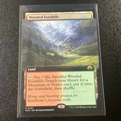 Wooded Foothills (Extended Art) Modern Horizons 3 Regular - Image 1